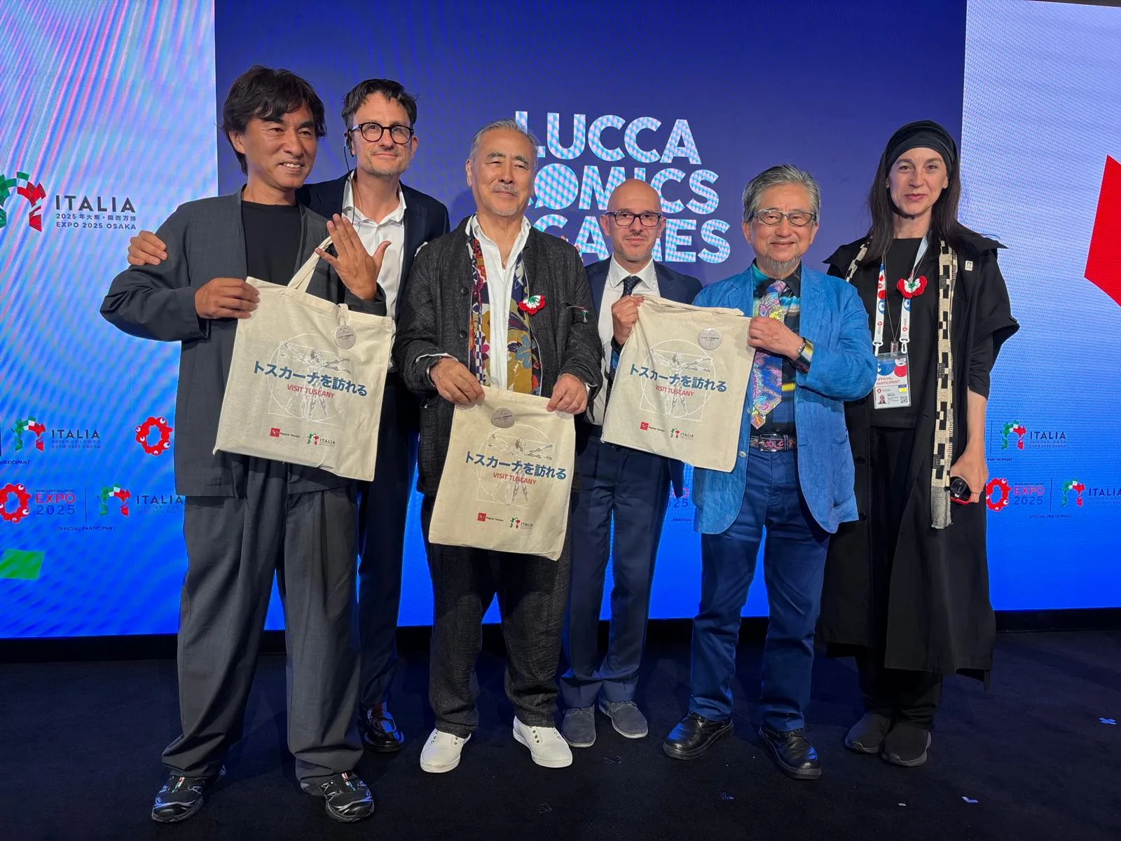 lucca comics amp games all8217expo di osaka amano firma un8217opera per mattarella e go nagai riceve il premio pegaso alla cultura